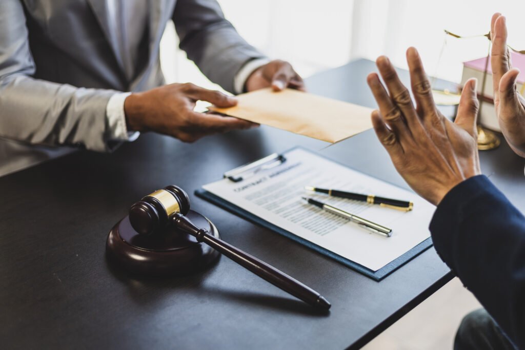 attorney-adjudicating-bribery-cases-businessman-trying-bribe-lawyer